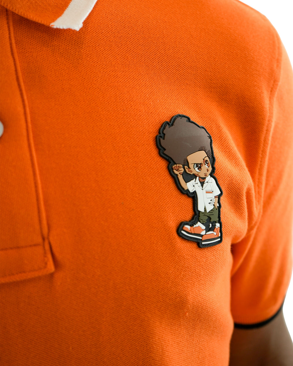 The Boondocks - Huey Orange Polo Shirt
